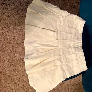Flared skirt; cream color; brandy Melville; one size fits all